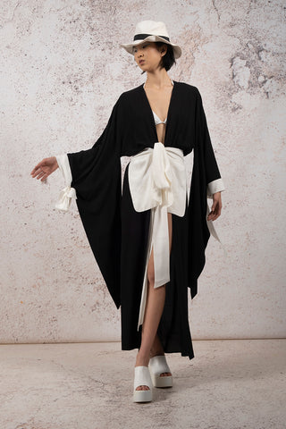 LONG YOU CAPE WITH LARGE POCKETS AND TIED BELT